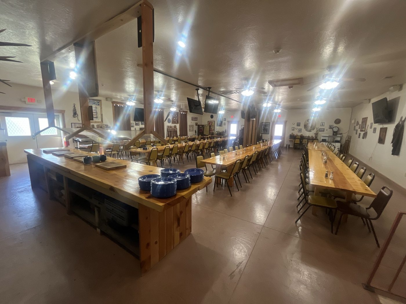 The long banquet table at Giff's set for a group